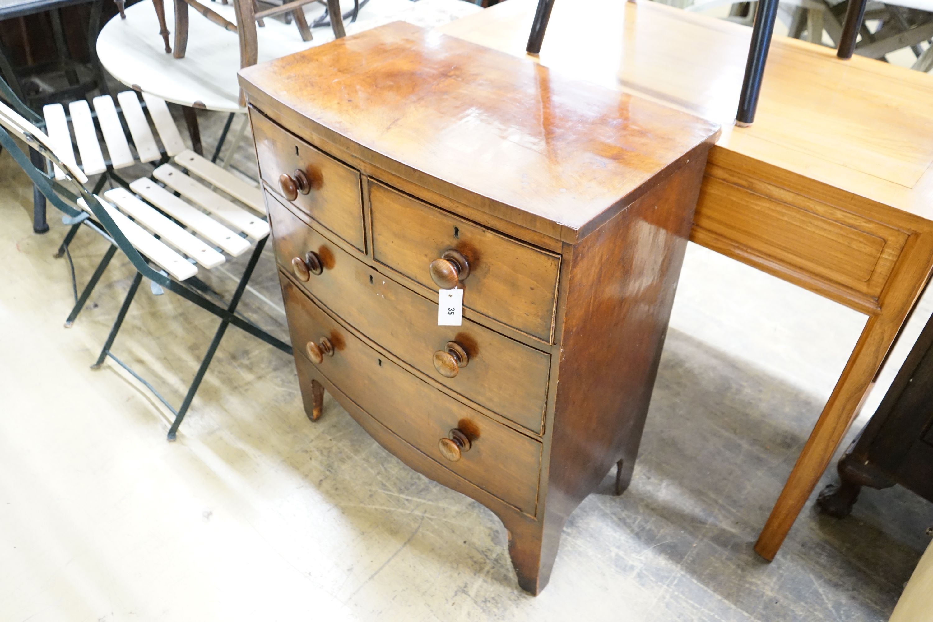 A small Victorian mahogany bow front chest, width 72cm, depth 42cm, height 87cm